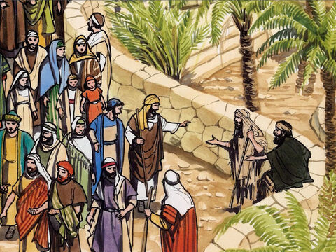 Quando ouviu a multidão passando, ele perguntou o que estava acontecendo.  Disseram-lhe: “Jesus de Nazaré está passando”. – Slide número 2