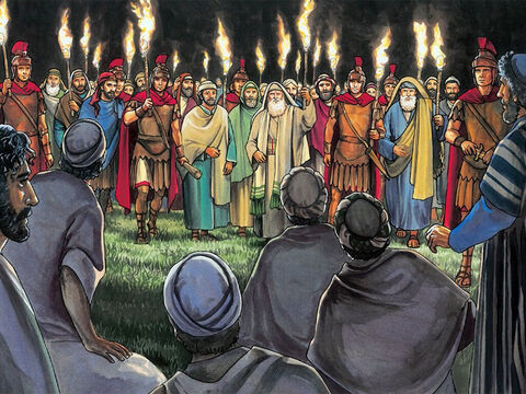 Enquanto ele ainda falava, apareceu uma multidão conduzida por Judas, um dos Doze. – Slide número 11