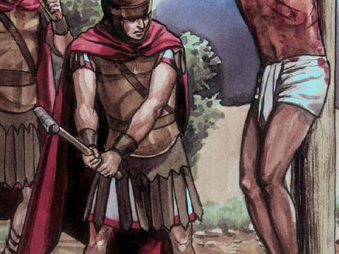 Vieram, então, os soldados e quebraram as pernas do primeiro homem que fora crucificado com Jesus e em seguida as do outro. – Slide número 3